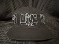 Assholes Live Forever Black Graffiti Hat